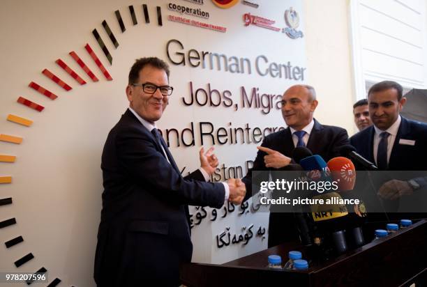 Dpatop - German Development Minister, Gerd Mueller opens a migration advisory center, with Iraqi Minister of Planning Ali Sindi, in Erbil, Iraq, 22...