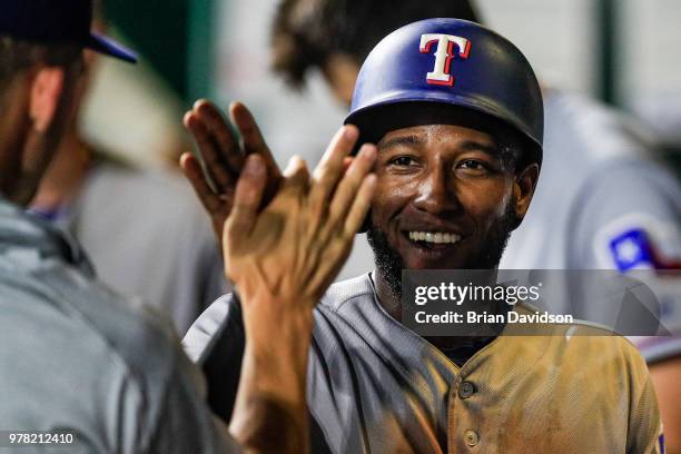 Jurickson Profar of the Texas Rangers celebrates scoring a run in the eighth inning against the Kansas City Royals at Kauffman Stadium on June 18,...