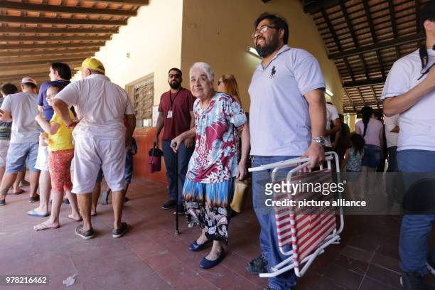 April 2018, Paraguay, Asunción: Voters queueing at a polling station in order to cast their vote for the presidential elections. Paraguay is voting a...