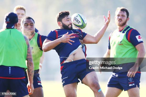 Colby Fainga'a is tackled by Sam Talakai during a Melbourne Rebels Super Rugby training session at Gosch's Paddock on June 19, 2018 in Melbourne,...