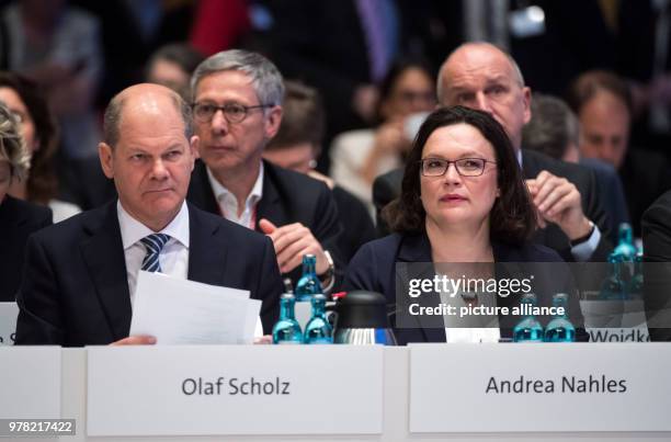 April 2018, Germany, Wiesbaden: Olaf Scholz , German finance minister, and Andrea Nahles, Bundestag group leader of the SPD, pictured at the...