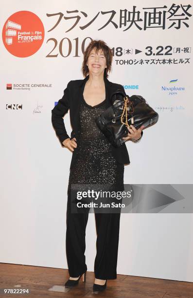 Actress Jane Barkin holds her Hermes Birkin handbag during the France Film Festival 2010 press conference at Roppongi Hills on March 18, 2010 in...