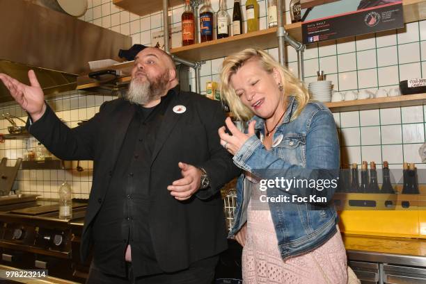 Grand Seigneur" editor in chief Bruno Malnuit and Chef Flora Mikula attend the "Filles A Cotelettes" Party Hosted by Grand Seigneur Magazine at...