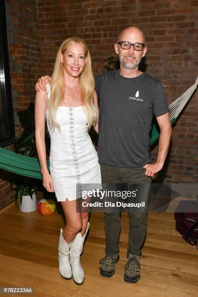 Recording artist Julie Mintz and Moby pose after performing at Sofar Sounds NYC at O.N.S Clothing on June 18, 2018 in New York City.