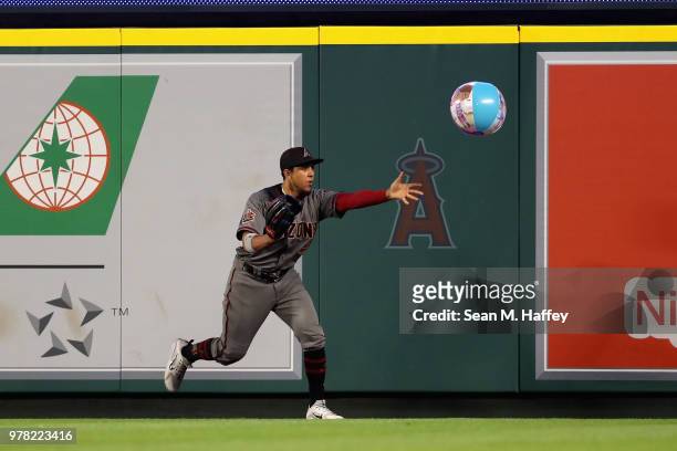 Jon Jay of the Arizona Diamondbacks throws a beachball during the fifth inning of a game against the Los Angeles Angels of Anaheim at Angel Stadium...