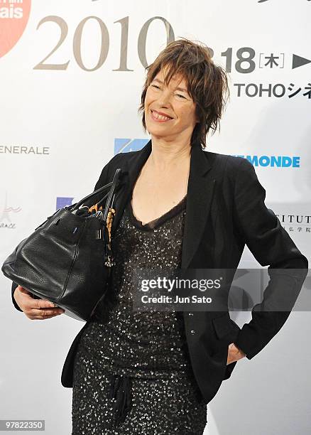 Actress Jane Barkin holds her Hermes Birkin handbag during the France Film Festival 2010 press conference at Roppongi Hills on March 18, 2010 in...