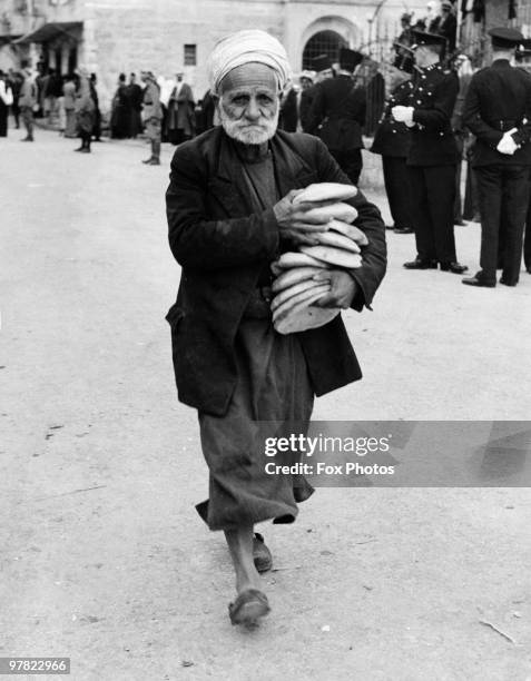 Armful Of Bread, News Photo