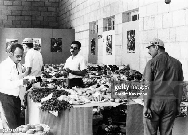 Fruit and vegetable stall at a fair in Hebron, in the West Bank, 1973.