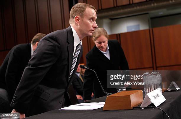 Former US Air Force Major Michael Almy ; and former US Navy Lieutenant Junior Grade Jenny Kopfstein take their seats prior to testifying during a...