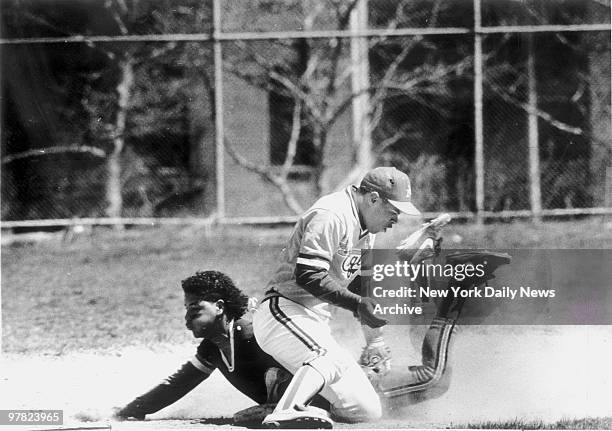 Washington High School's Manny Ramirez steals second as Monroe Effram Santiago covers during a high school game.