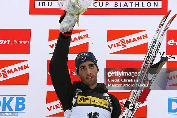 Martin Fourcade of France celebrates after the men's sprint in the E.On Ruhrgas IBU Biathlon World Cup on March 18, 2010 in Oslo, Norway.