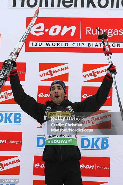 Martin Fourcade of France celebrates after winning the men's sprint in the E.On Ruhrgas IBU Biathlon World Cup on March 18, 2010 in Oslo, Norway.