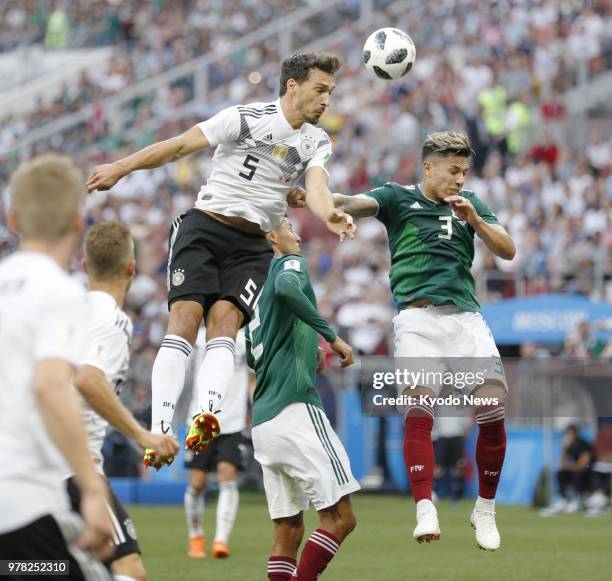 Mats Hummels of Germany towers above Carlos Salcedo of Mexico during the second half of a World Cup Group F match in Moscow on June 17, 2018. Mexico...