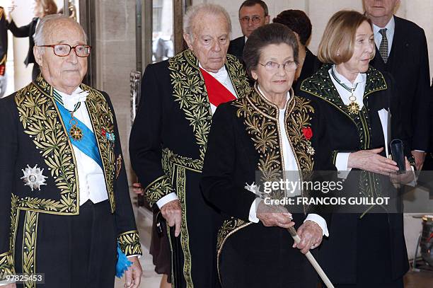 French Simone Veil , an Auschwitz survivor and the first elected president of the European parliament, flanked by French Academicians, historian...