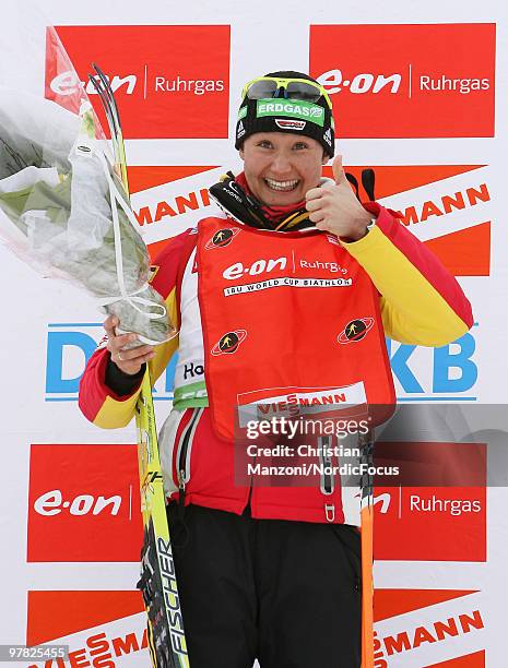 Simone Hauswald of Germany celebrates after winning the women's sprint in the E.On Ruhrgas IBU Biathlon World Cup on March 18, 2010 in Oslo, Norway.