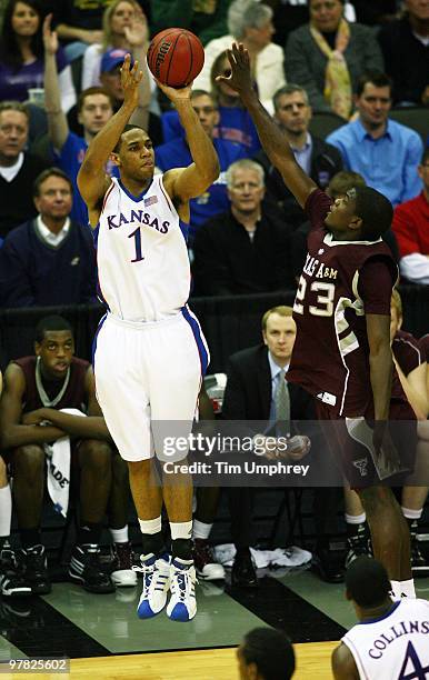 Xavier Henry of the Kansas Jayhawks shoots a three pointer against the Texas A&M Aggies during the semifinals of the 2010 Phillips 66 Big 12 Men's...