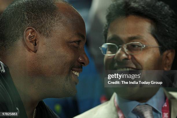 Brain Lara and Lalit Modi watch the match between Mumbai Indians and Delhi Daredevils in New Delhi on Wednesday.