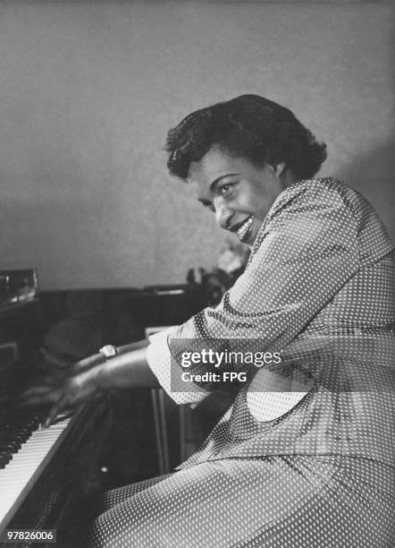 Ragtime pianist Winifred Atwell in concert in London, 1954.