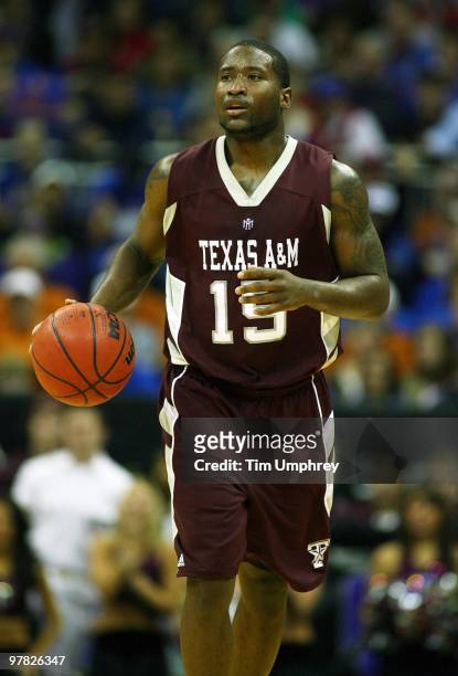 Donald Sloan of the Texas A&M Aggies brings the ball up the court against the Kansas Jayhawks during the semifinals of the 2010 Phillips 66 Big 12...