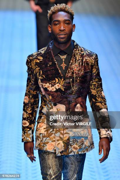 Tinie Tempah walks the runway at the Dolce & Gabbana show during Milan Men's Fashion Week Spring/Summer 2019 on June 16, 2018 in Milan, Italy.