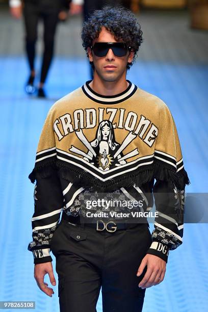 Model walks the runway at the Dolce & Gabbana show during Milan Men's Fashion Week Spring/Summer 2019 on June 16, 2018 in Milan, Italy.