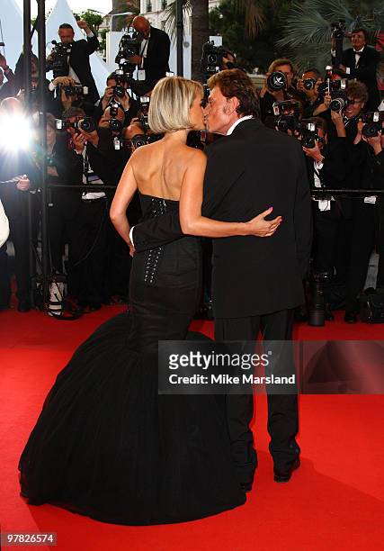 Actor and singer Johnny Hallyday and his wife Laeticia Hallyday attend the "Vengeance" premiere at the Grand Theatre Lumiere during the 62nd Annual...