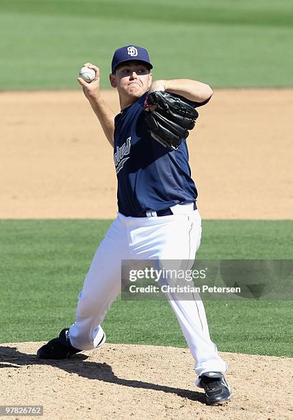 Relief pitcher Tim Stauffer of the San Diego Padres pitches against the Chicago Cubs during the MLB spring training game at Peoria Stadium on March...