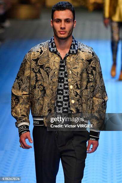 Model walks the runway at the Dolce & Gabbana show during Milan Men's Fashion Week Spring/Summer 2019 on June 16, 2018 in Milan, Italy.