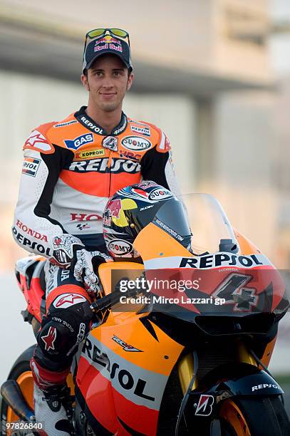 Andrea Dovizioso of Italy and Repsol Honda Team poses on the track with his bike during the official photograph for the start of the season during...