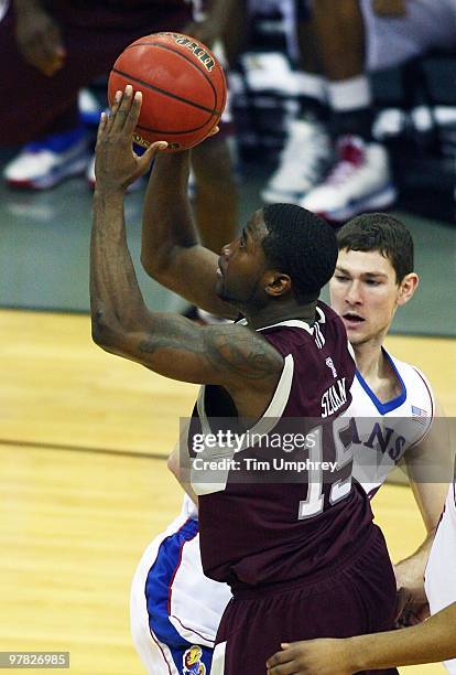 Donald Sloan of the Texas A&M Aggies shoots a running jump shot against the Kansas Jayhawks during the semifinals of the 2010 Phillips 66 Big 12...