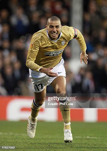 David Trezeguet of Juventus celebrates scoring the opening goal during the UEFA Europa League Round of 16 second leg match between Fulham and...