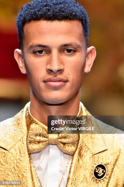 Model walks the runway at the Dolce & Gabbana show during Milan Men's Fashion Week Spring/Summer 2019 on June 16, 2018 in Milan, Italy.