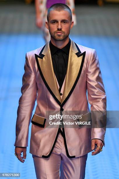 Marcus Butler walks the runway at the Dolce & Gabbana show during Milan Men's Fashion Week Spring/Summer 2019 on June 16, 2018 in Milan, Italy.