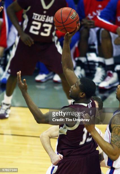 Donald Sloan of the Texas A&M Aggies shoots a running jump shot against the Kansas Jayhawks during the semifinals of the 2010 Phillips 66 Big 12...