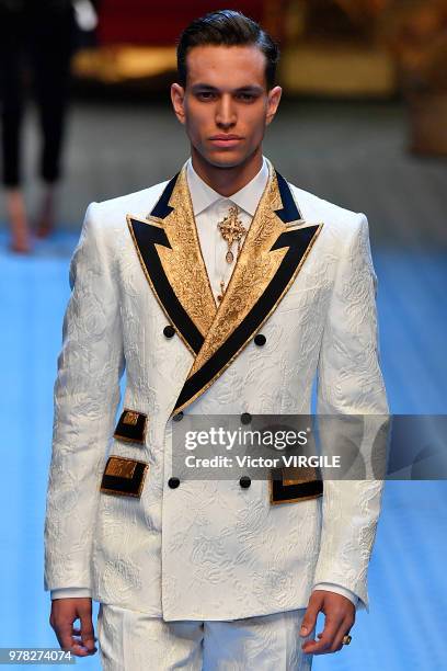 Model walks the runway at the Dolce & Gabbana show during Milan Men's Fashion Week Spring/Summer 2019 on June 16, 2018 in Milan, Italy.