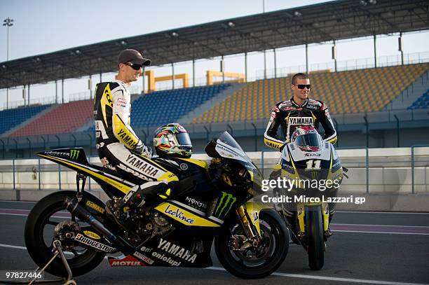 Ben Spies of USA and Colin Edwards of USA and Monster Yamaha Tech 3 pose on the track during the official photo for the start of the season during...