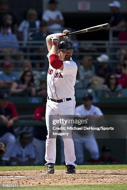 Kevin Youkilis of the Boston Red Sox bats during a game against the Pittsburgh Pirates at at City of Palms Park on March 13, 2010 in Fort Myers,...