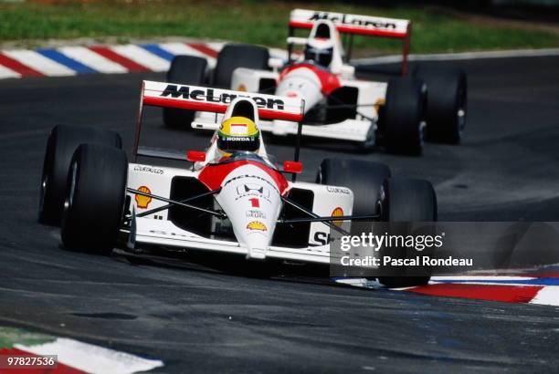 Ayrton Senna driving the Marlboro McLaren-Honda MP4/5B ahead of his team mate Gerhard Berger during the German Grand Prix on 29 July 1990 at the...