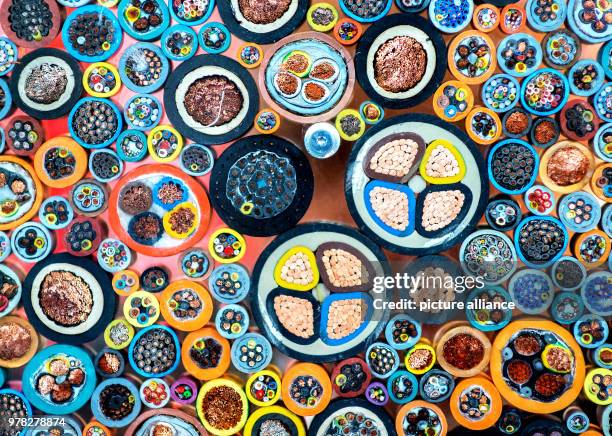 April 2018, Germany, Hanover: Different sections from copper cabled at the ConCab at the Hanover fair. Photo: Hauke-Christian Dittrich/dpa