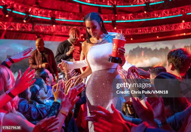 Personality Kim Kardashian, winner of the Best Reality Series/Franchise award for 'Keeping Up with the Kardashians', walks off stage during the 2018...