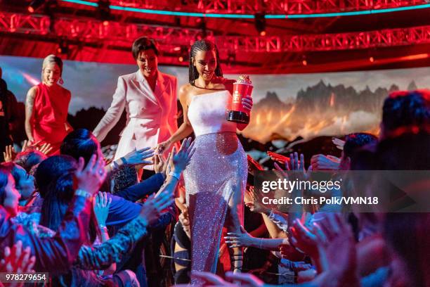 Personality Kim Kardashian, winner of the Best Reality Series/Franchise award for 'Keeping Up with the Kardashians', walks off stage during the 2018...