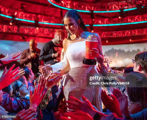 Personality Kim Kardashian, winner of the Best Reality Series/Franchise award for 'Keeping Up with the Kardashians', walks off stage during the 2018...