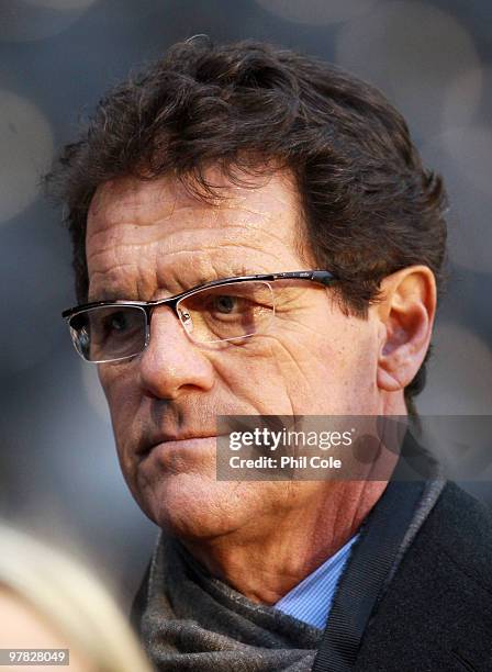 Fabio Cappello, coach of England looks on ahead of the UEFA Europa League Round of 16 second leg match between Fulham and Juventus at Craven Cottage...