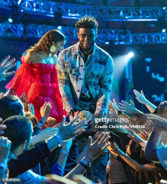 Actor Chadwick Boseman accepts the Best Performance in a Movie award for 'Black Panther' onstage during the 2018 MTV Movie And TV Awards at Barker...