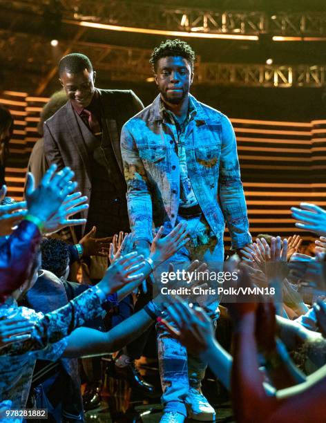 Actor Chadwick Boseman accepts the Best Performance in a Movie award for 'Black Panther' onstage during the 2018 MTV Movie And TV Awards at Barker...