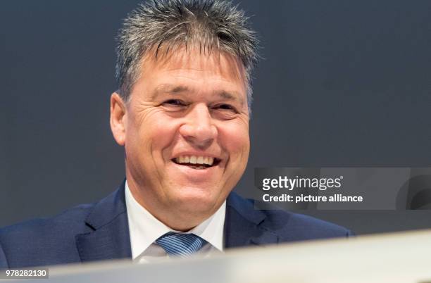 April 2018, Germany, Essen: Uwe Tigges, CEO of energy company Innogy, smiles at his company's general meeting. Photo: Bernd Thissen/dpa
