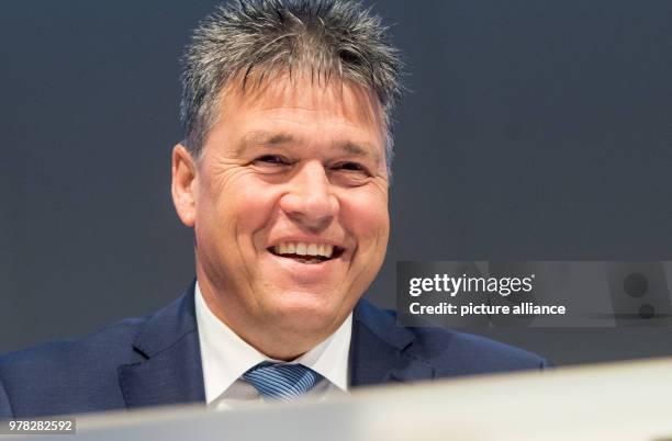 Uwe Tigges, CEO of energy company Innogy, smiles during the company's general meeting in Essen, Germany, 24 April 2018. Photo: Bernd Thissen/dpa