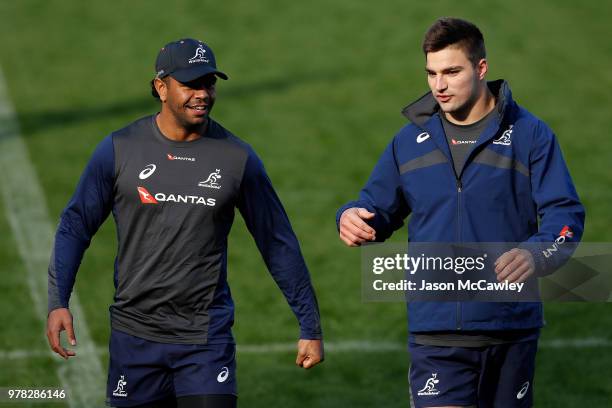 Kurtley Beale speaks to Jack Maddocks during an Australian Wallabies training session at Leichhardt Oval on June 19, 2018 in Sydney, Australia.