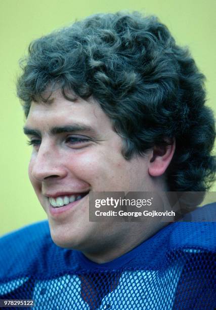 Quarterback Dan Marino of the University of Pittsburgh Panthers college football team smiles for photographers during a photo session before the...