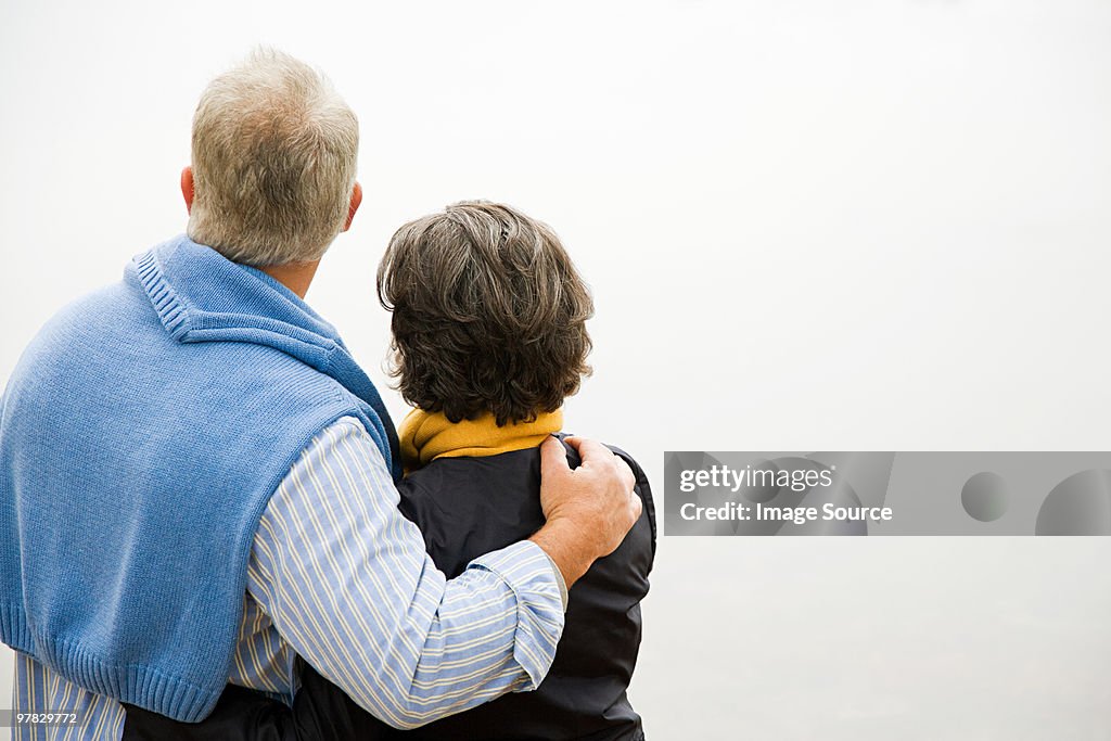 Rear view of mature couple